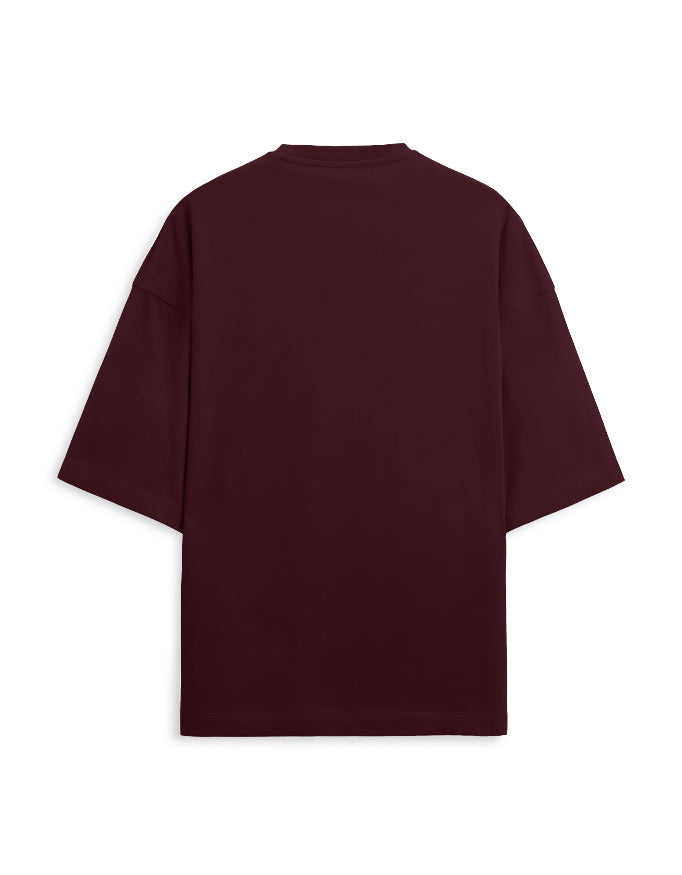 Maroon t-shirt with black text on the back against a white background