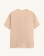 Peach t-shirt on a white background