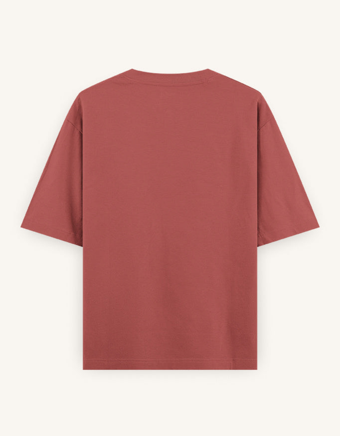 Coral t-shirt on a white background