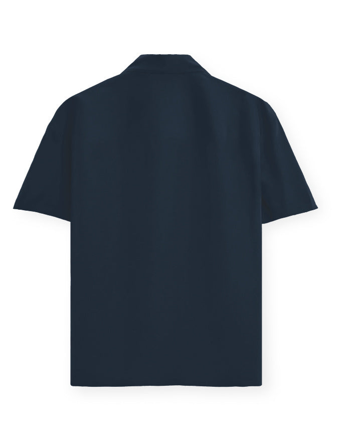 Navy blue polo shirt on a white background