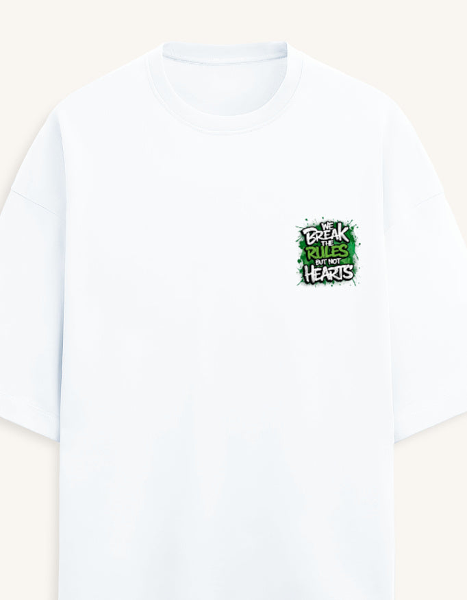 A white short-sleeve crewneck t-shirt with a small black stylized 'V' logo on the left chest, displayed against a solid taupe background.