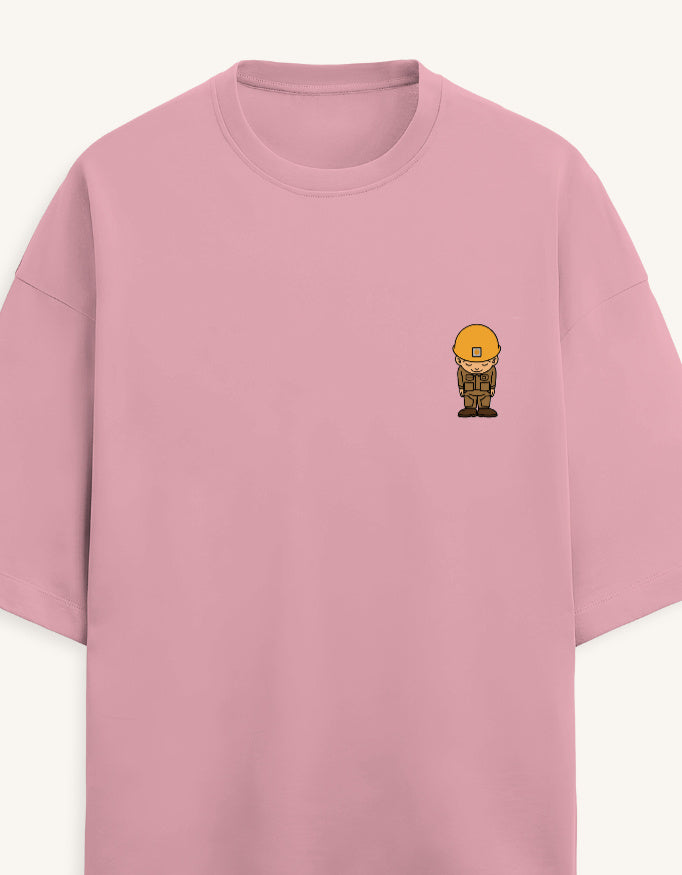 Front view of a premium white unisex terry oversized t-shirt featuring a small cartoon character graphic on the left chest pocket area.